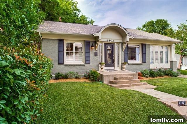Charming bungalow exterior with mature landscaping at 6103 Hudson Street.