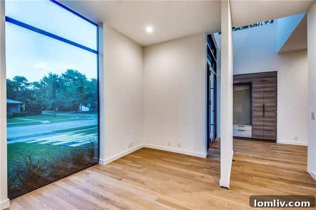 The unique pivot wall leading to the home office in Midway Hollow
