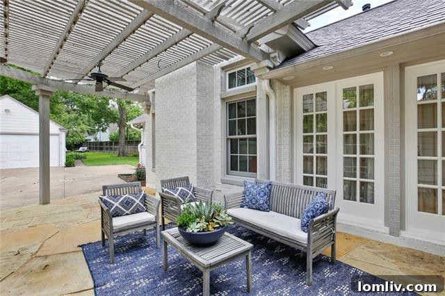 Cozy mudroom with coffee nook, stainless steel counters, and pantry storage leading directly to an inviting outdoor patio