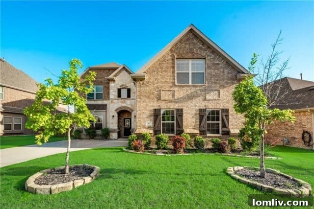 Exterior view of a classic Fate, Texas home with brick facade
