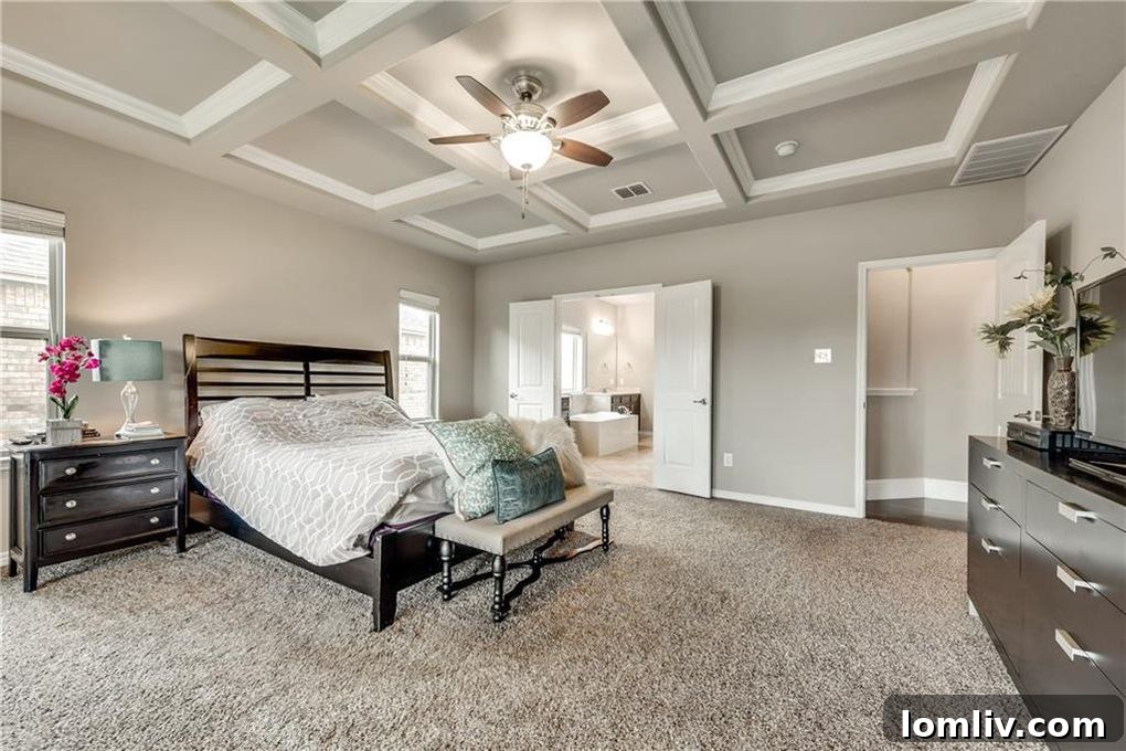 Luxurious master bedroom with coffered ceiling