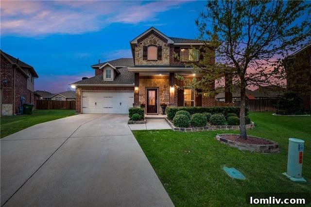 Inviting exterior of a cul-de-sac home in Fate, Texas