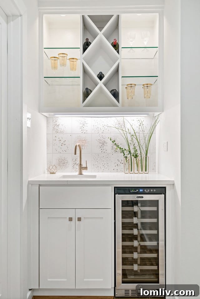 Chic Entryway with Art Niche and Designer Lighting