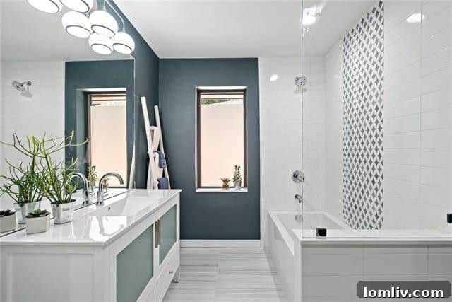 Kitchen Island with Pendant Lighting and Blue Subway Tile Backsplash