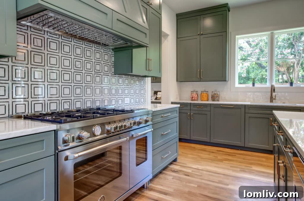 Gourmet kitchen at 700 N. Bailey featuring state-of-the-art Bertazzoni appliances, a testament to high-end design in Fort Worth new construction.