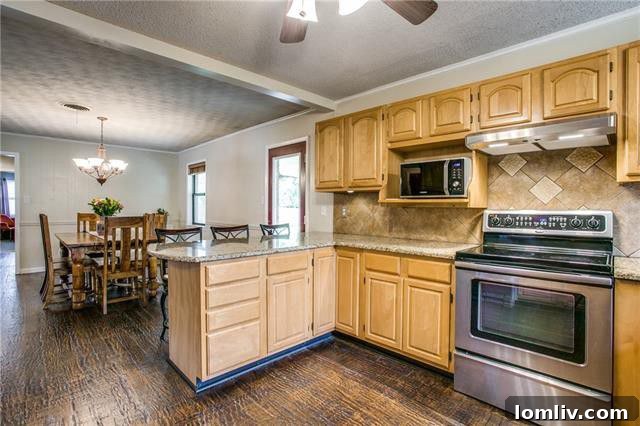Interior view of the updated kitchen showcasing a built-in lazy Susan, modern cabinetry, and ample counter space