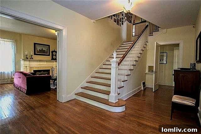 A grand hallway in the Sandidge-Walker House showing ample space and light.