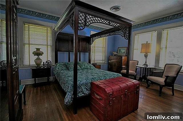 The grand staircase and a glimpse of the impressive linen cabinet.
