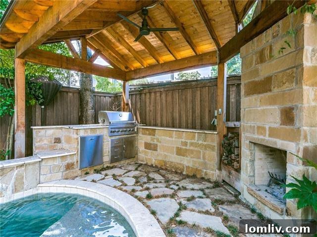 Resort-style Backyard with Pool, Waterfall, and Covered Porch