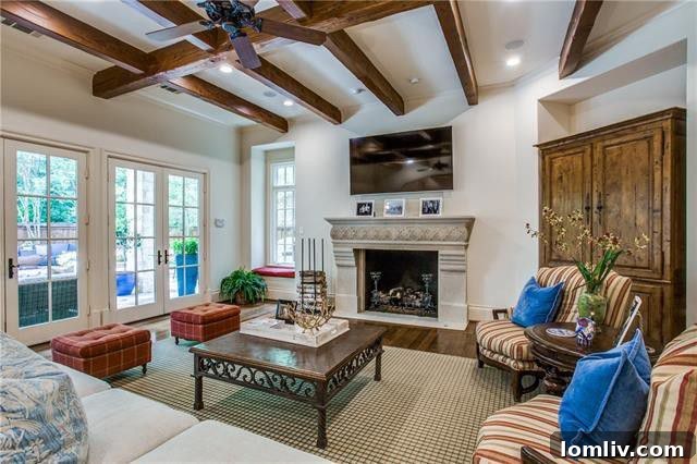 Luxurious Living Room with High Ceilings and Fireplace