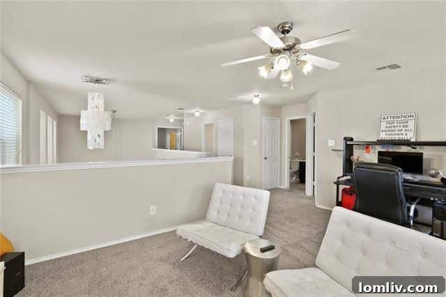 Elegant Living Room with Plush Carpet and Modern Chandelier