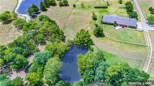 Rockwall home with private pond and vast backyard space