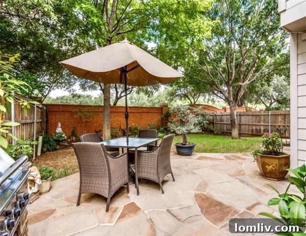 Outdoor patio with built-in BBQ connection and Oklahoma flagstone
