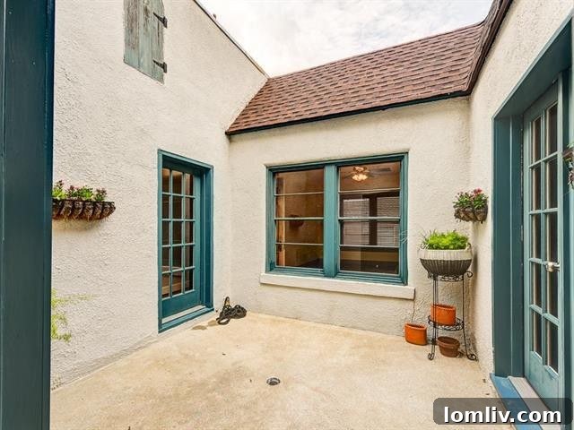 Tranquil Tiled Courtyard: A Favorite Spot in the Luna's Renovated Home