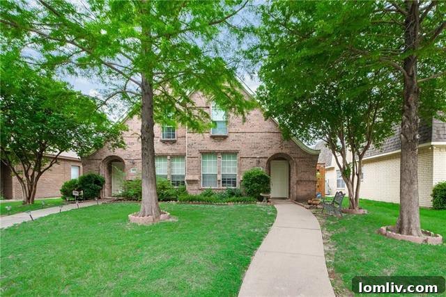 Exterior of the two-story brick duplex at 2915 Allister Street, Dallas, offering an attractive and well-maintained appearance.