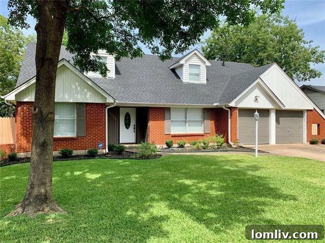 Exterior front view of the charming starter home at 2885 Meadows Port Drive, Farmers Branch, showing a well-maintained lawn and classic brick facade.