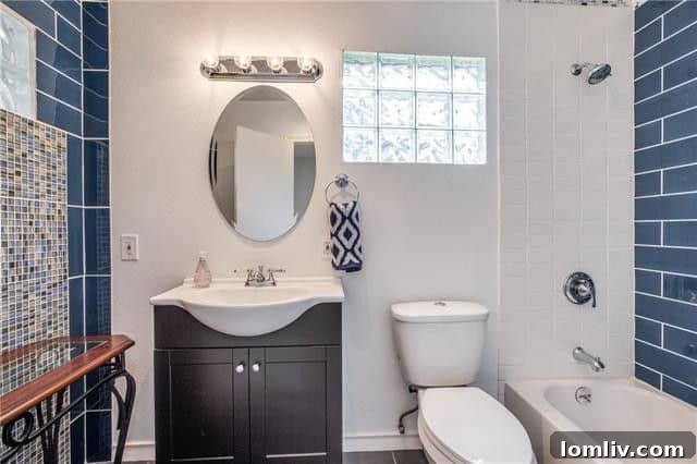 Cozy dining area featuring stylish shiplap accent wall, ideal for casual meals or intimate dinners.