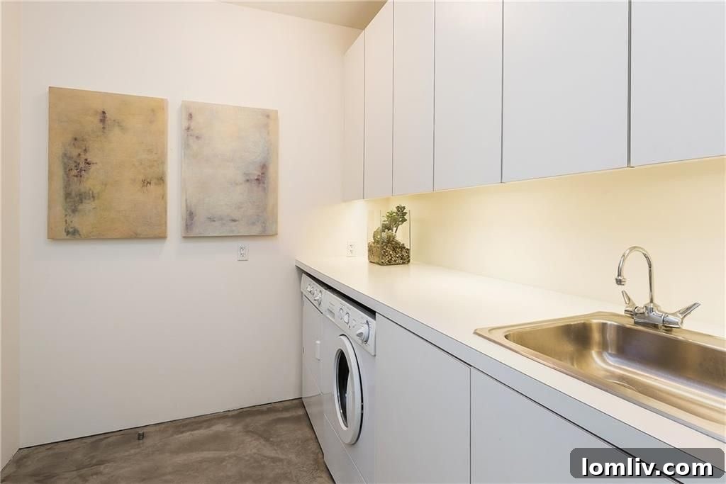 Interior view of 3740 Holland Art House unit, showcasing museum-finish walls and gleaming concrete floors