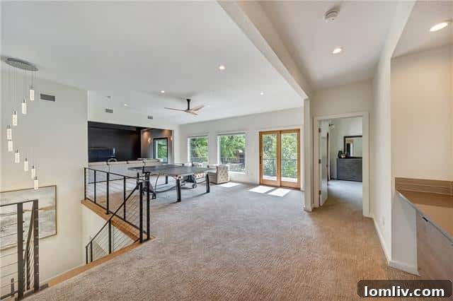 Upper Level Living Area - Balconies with Backyard Views