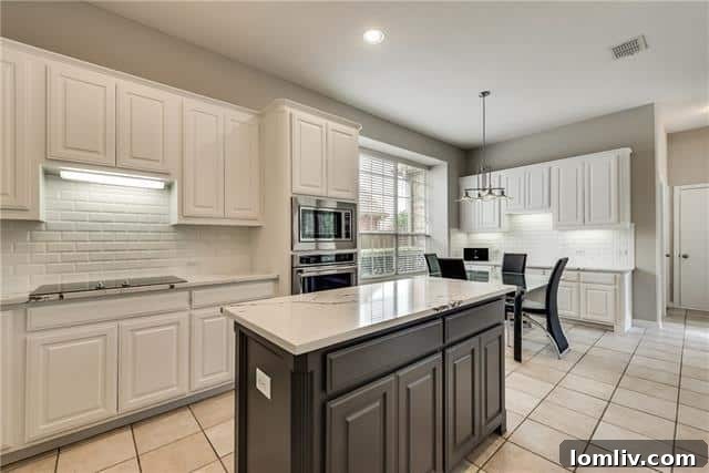 Modern kitchen with quartz countertops and stainless steel appliances