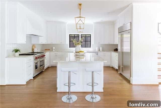 Gourmet Marble Kitchen with Island and Bar Seating, Dallas Luxury Home