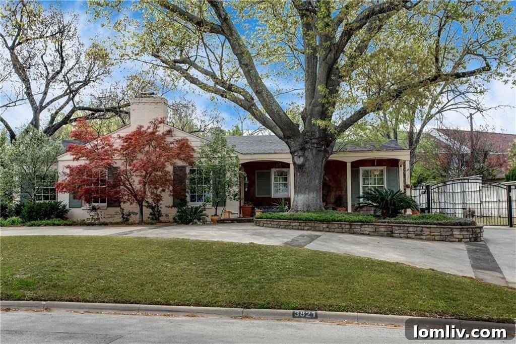 The elegant facade of 3821 Crestwood Terrace, featuring lush landscaping.