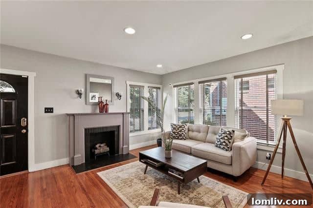 Modernized kitchen with sleek finishes and ample storage, blending historic charm with contemporary function.