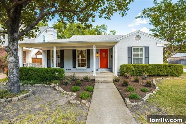 Vibrant red, white, and blue exterior of 5947 Marquita Avenue, a classic Lower Greenville home