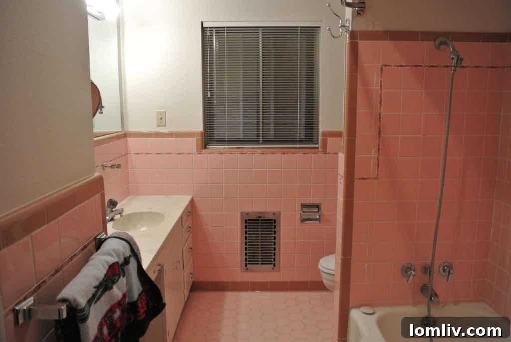 Before renovation: A charming but small midcentury bathroom, demonstrating the typical constraints of its era.