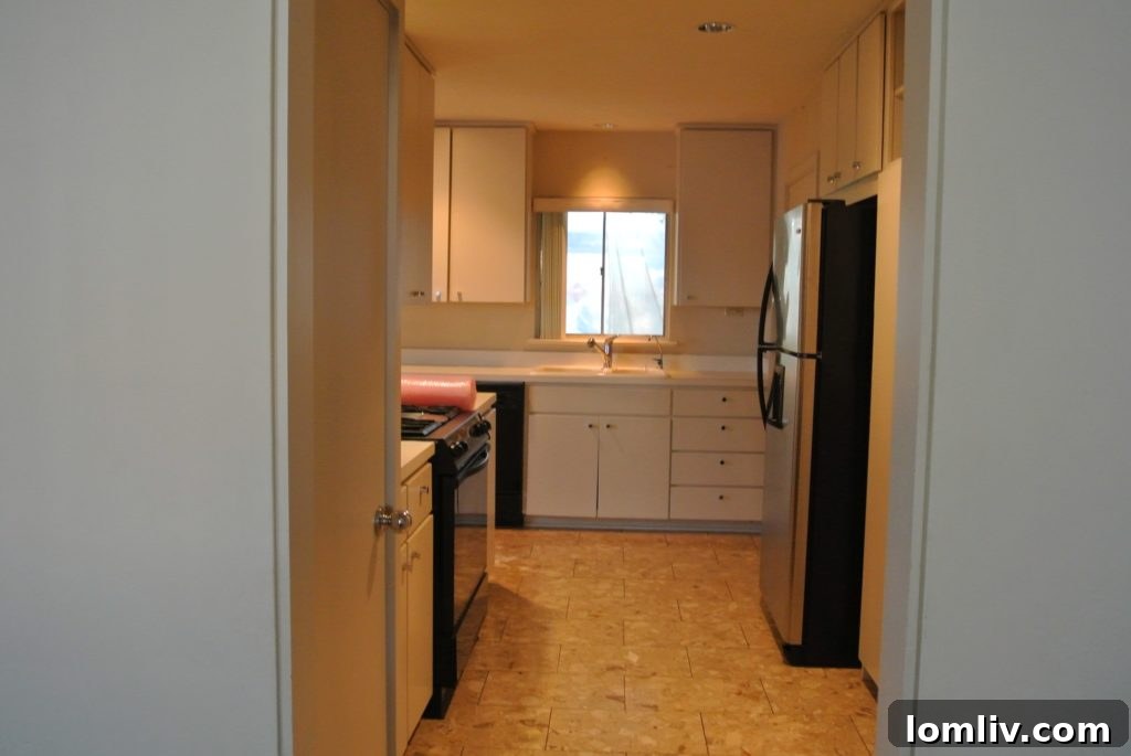 Before renovation: A closed-off midcentury kitchen, typical of its era, not ideal for entertaining.