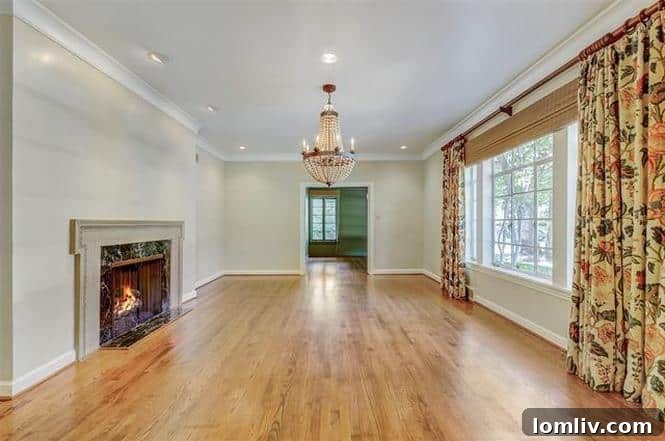 Spacious Living Room with Fireplace and Hardwood Floors