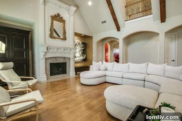 Spacious Living Room with Hardwood Floors and Crown Molding
