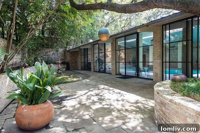 Lush exterior grounds and landscaping of the O'Neil Ford estate