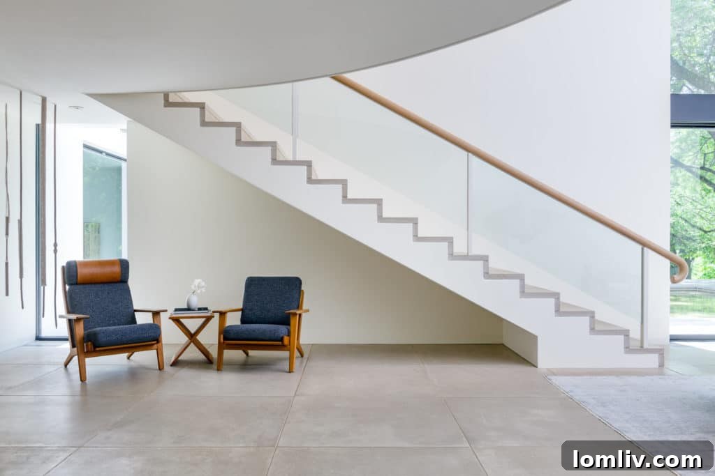 Edward Larrabee Barnes' Signature Modern Estate in Preston Hollow 3 Grand limestone staircase leading to elegant living room