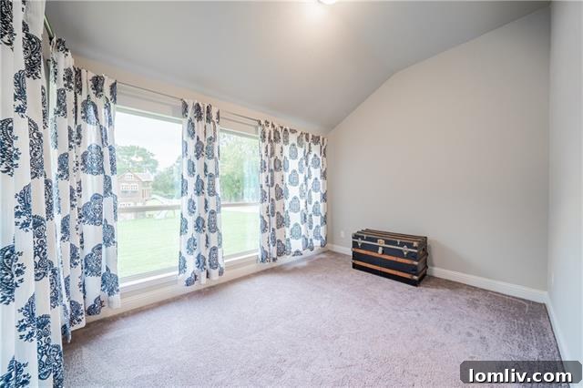 Spacious Backyard with Covered Patio and Playground at 404 W. 3rd St.