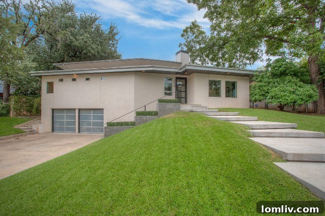The architectural design of 304 Crestwood Drive, showing how it harmonizes with the natural topography of the Crestwood neighborhood.