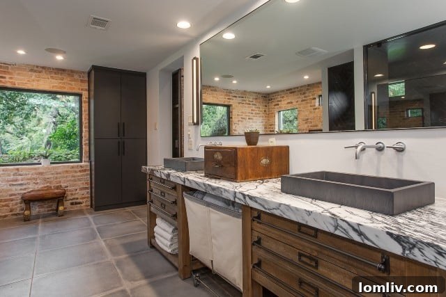 Elegant concrete sinks sourced from Greece, integrated into the master bathroom design.