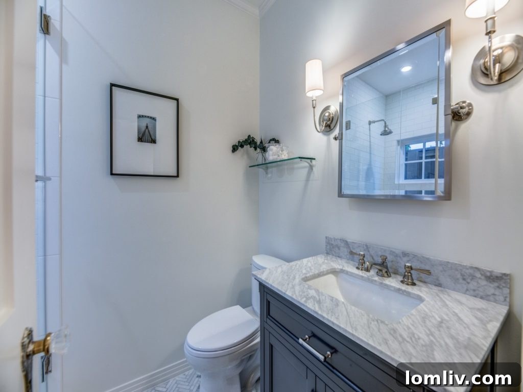 Guest bathroom with marble and subway tile