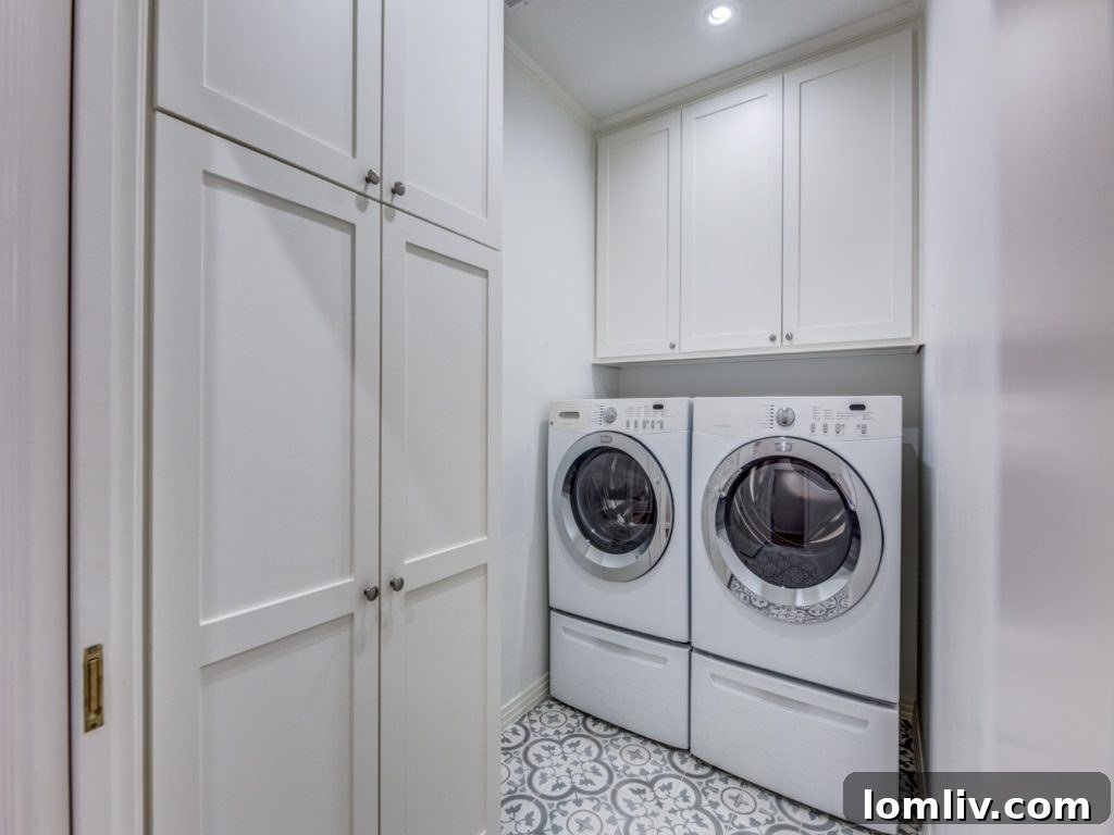 New laundry room with custom shaker cabinetry