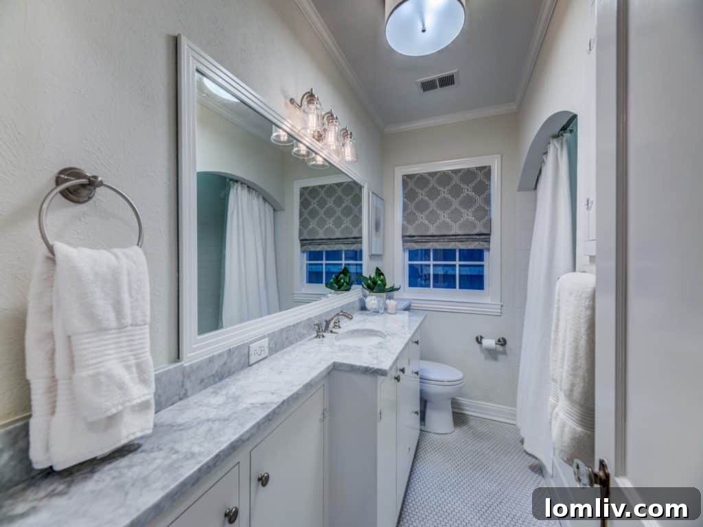 Custom cabinetry and modern fixtures in renovated kitchen