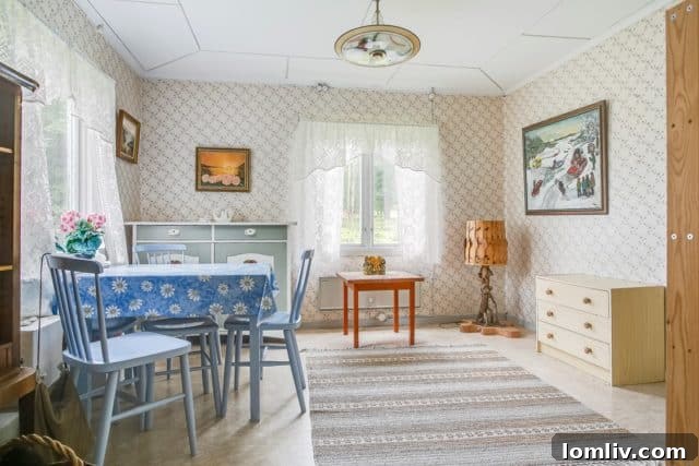Another charming bedroom with unique artwork, showcasing the distinctive character of the home.