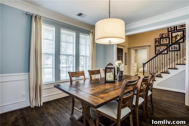 Open Concept Living Area with Fireplace and Hardwood Floors