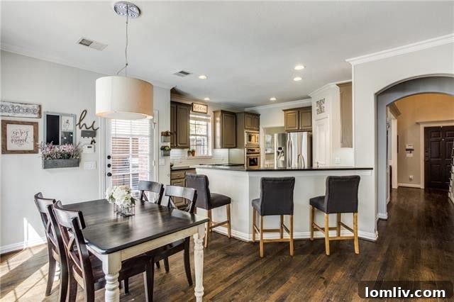 Gourmet Kitchen with Black Granite and Stainless Steel Appliances