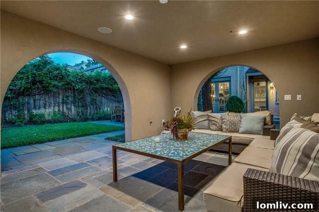 Outdoor patio with classic Spanish-Mediterranean details