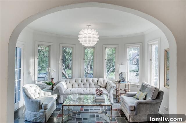 Dining area with elegant chandelier and period details