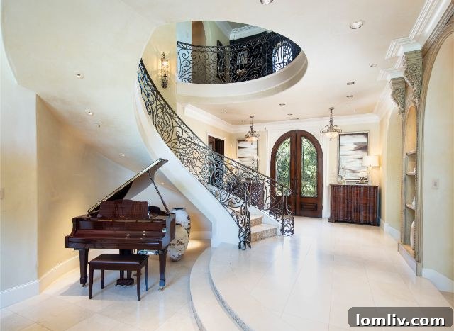 Coppell Luxury Home Grand Foyer and Sweeping Staircase