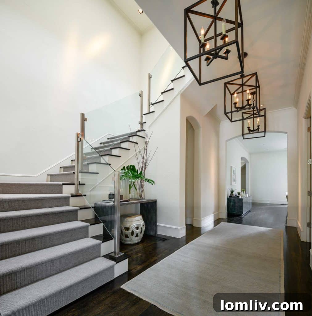 Glass panel staircase in Highland Park home