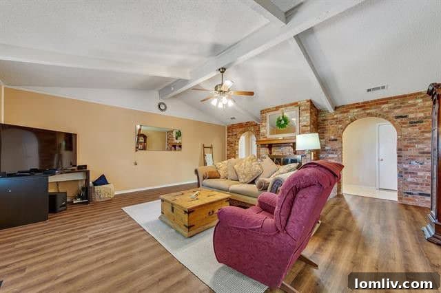 Cozy Living Room with Fireplace and Vaulted Ceilings
