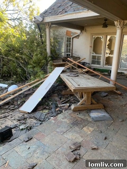 Demolished structure and scattered furniture inside Tyler Seguin's Preston Hollow home following the tornado's path of destruction.