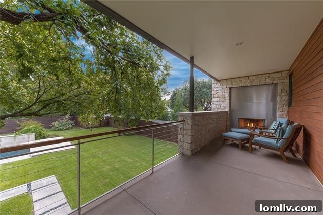 Bernbaum/Magadini's Hill Country Modern Masterpiece 12 Master Balcony with Outdoor Fireplace
